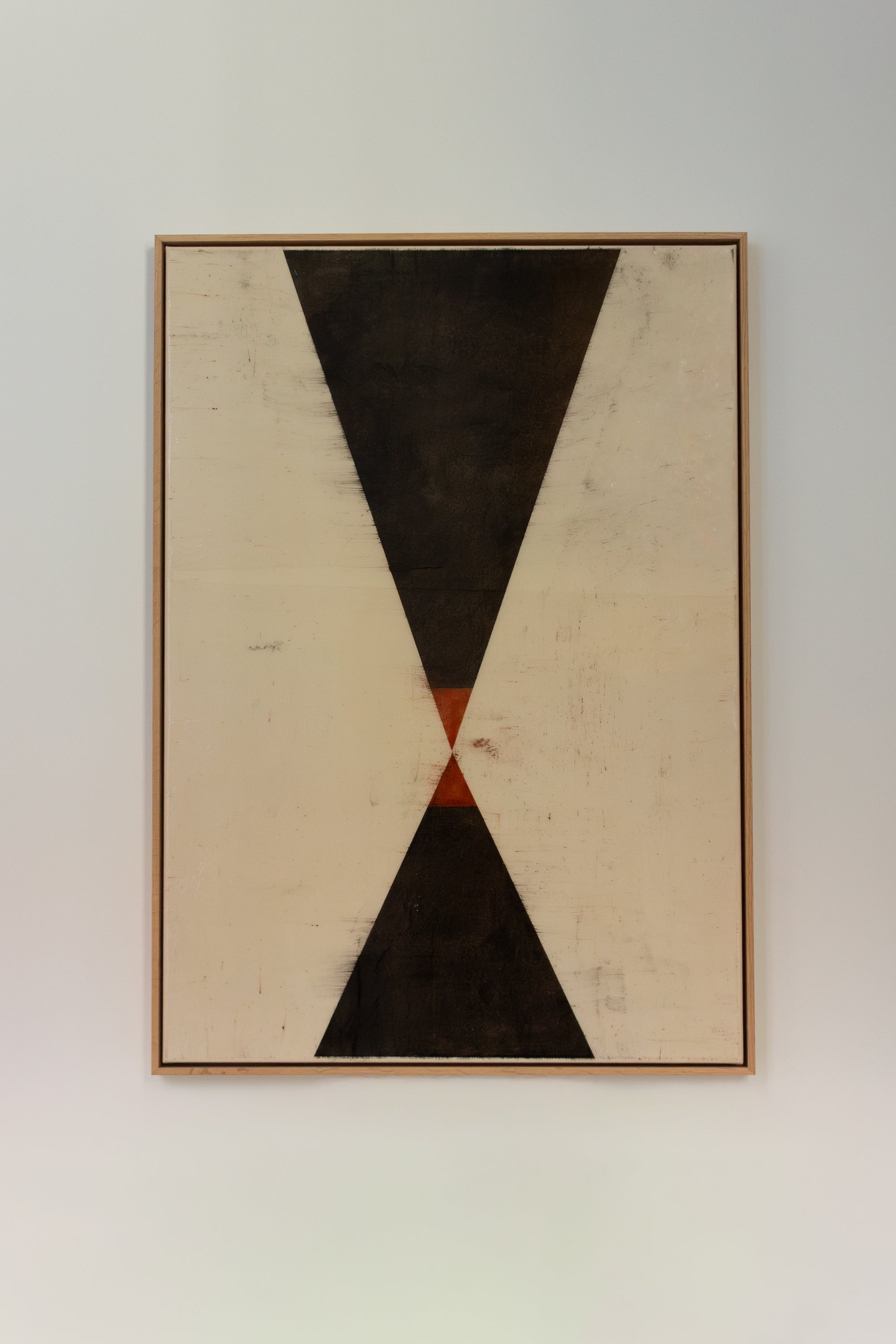 two black triangles with red